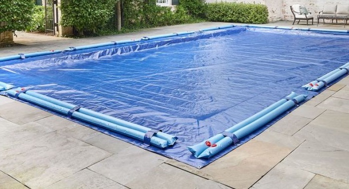 Rectangle pool cover with water bags