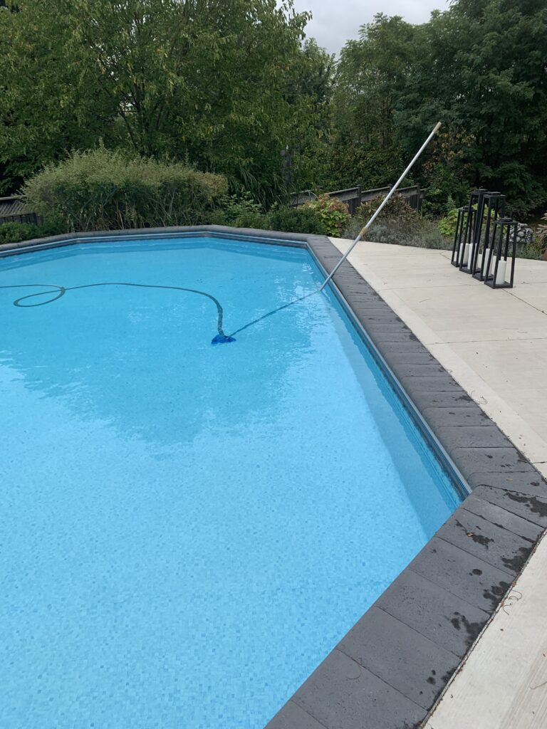 Vacuuming the pool